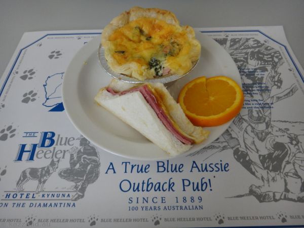 Quiche, sandwich and fruit