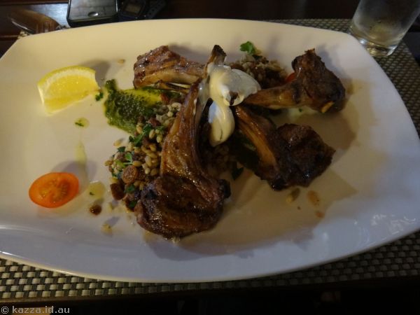 Lamb ribs with pesto, natural Greek yoghurt and lemon, served with pearl barley super salad