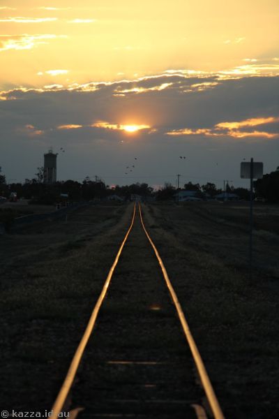 When you're standing on the Tropic of Capricon at equinox with an east-west railway line at sunset