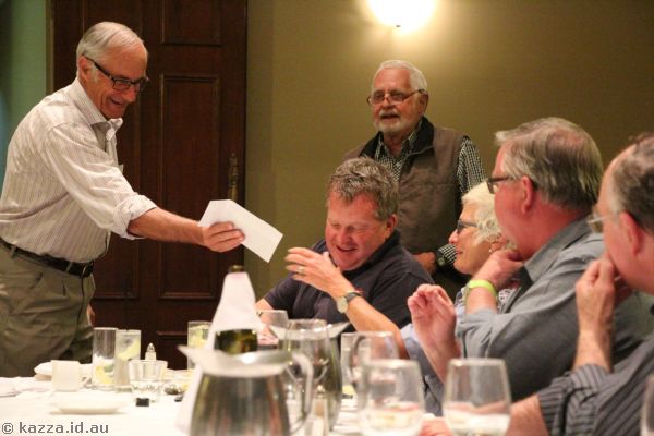 Rod presenting a gift to John and Penny