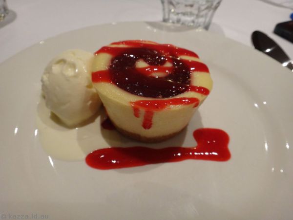 Baked raspberry cheesecake w mixed berry compote