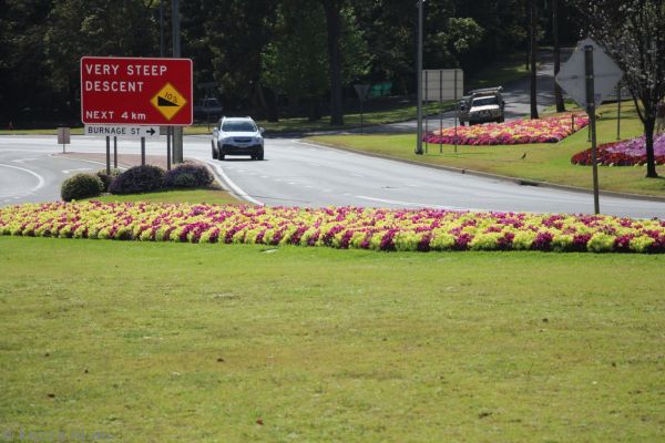 Very steep descent sign at the top of the hill