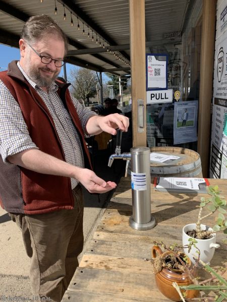 Stu using the hand sanitiser at TRBC