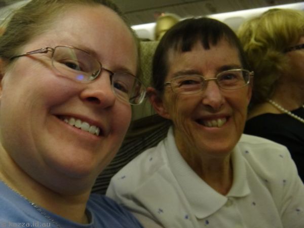 Me and Mum on the plane ready to go our our adventure